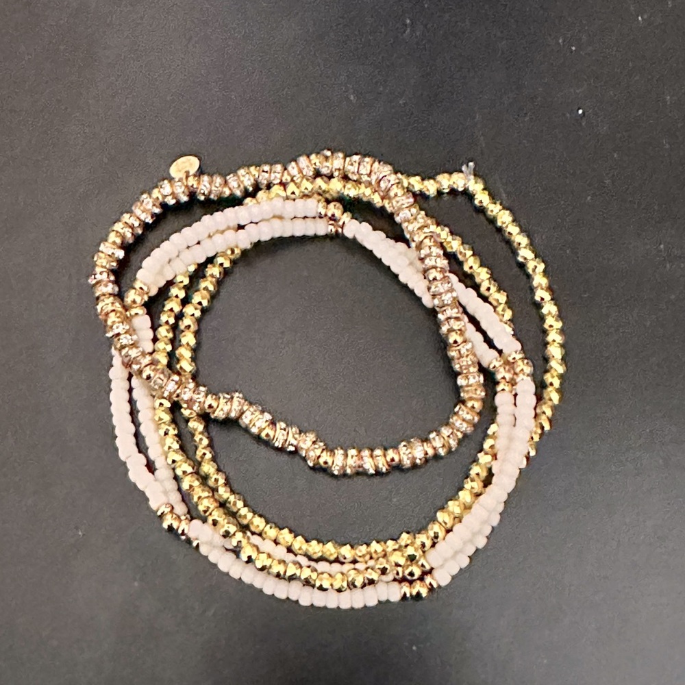White and Gold Bracelets